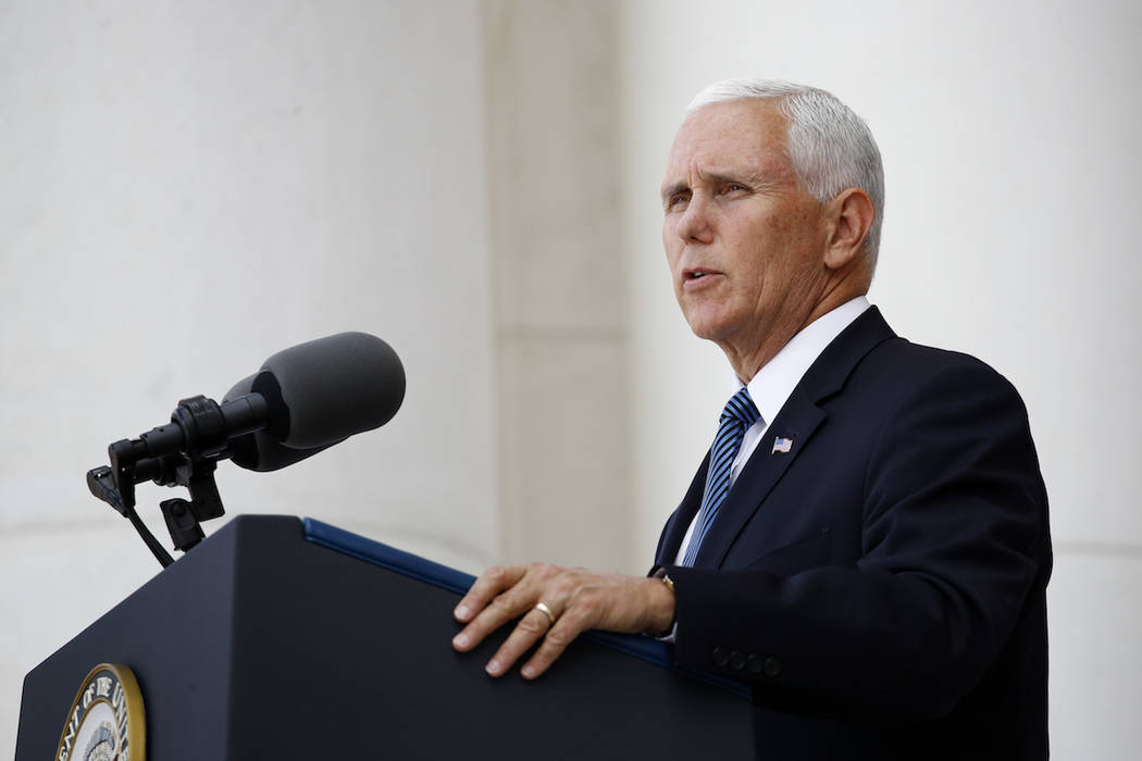 Vice President Mike Pence speaks at a Memorial Day ceremony after placing a wreath in front of ...