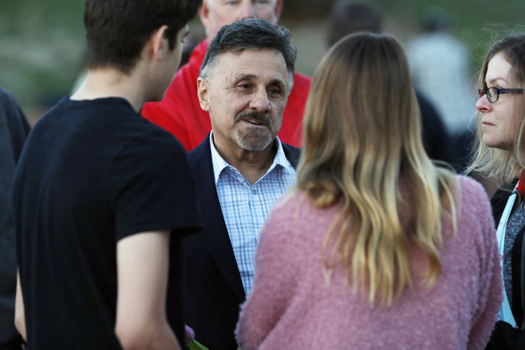 FILE - In this Friday, April 19, 2019, file photograph, Frank DeAngelis, center, greets well-wi ...