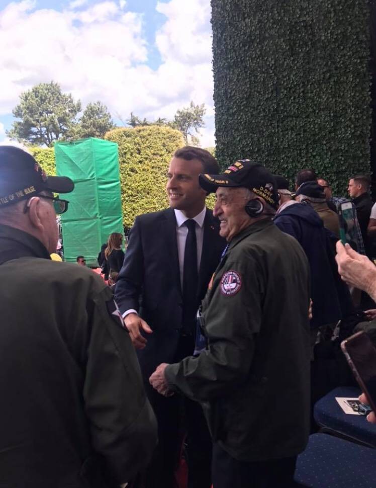 World War II Army veteran Onofrio "No-No" Zicari, 96, poses for a photo with French President E ...