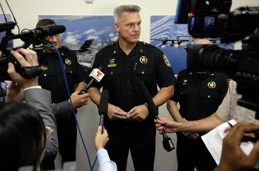 Okaloosa County, Fla.,Sheriff Larry Ashley fields questions from the media after Florida Gov. R ...