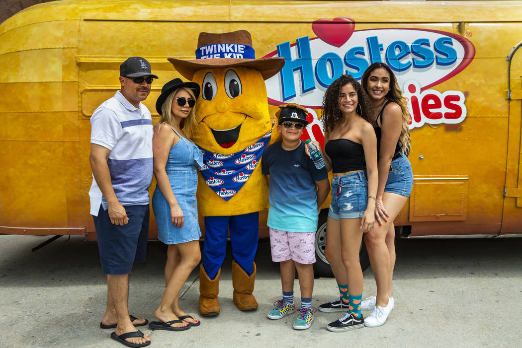 Twinkie the Kid poses with a family of Los Angeles while on a stop at the Hoover Dam in celebra ...