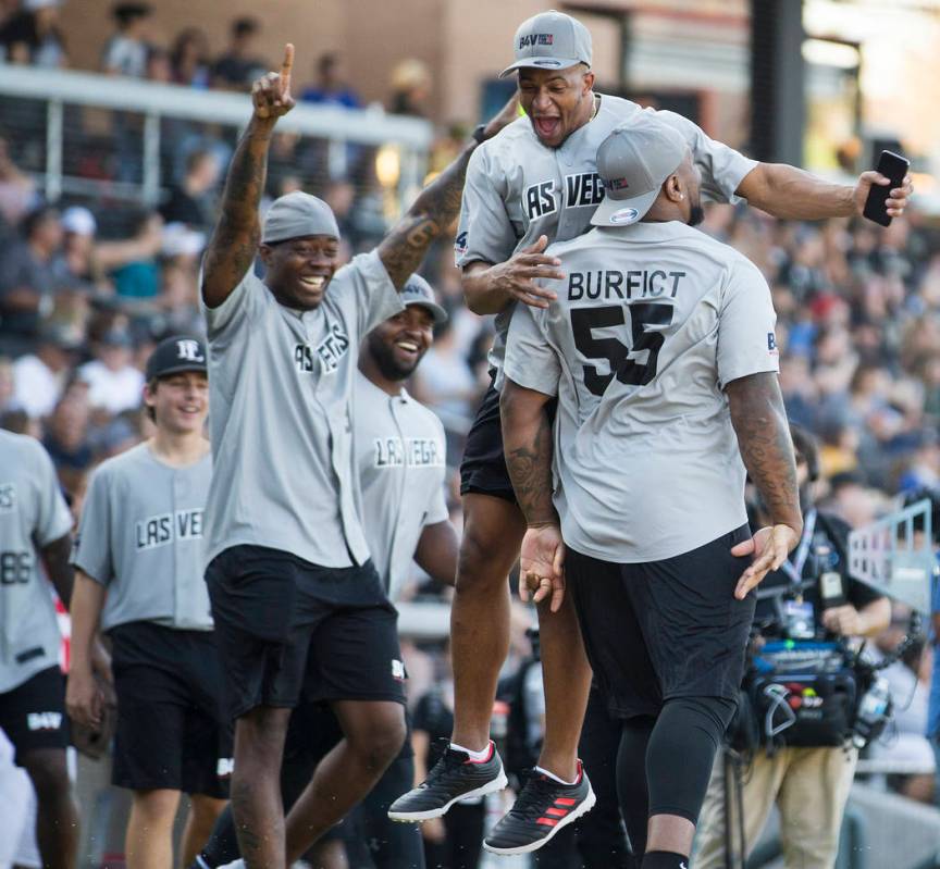 Oakland Raiders linebacker Vontaze Burfict, right, celebrates with Oakland Raiders safety Johna ...