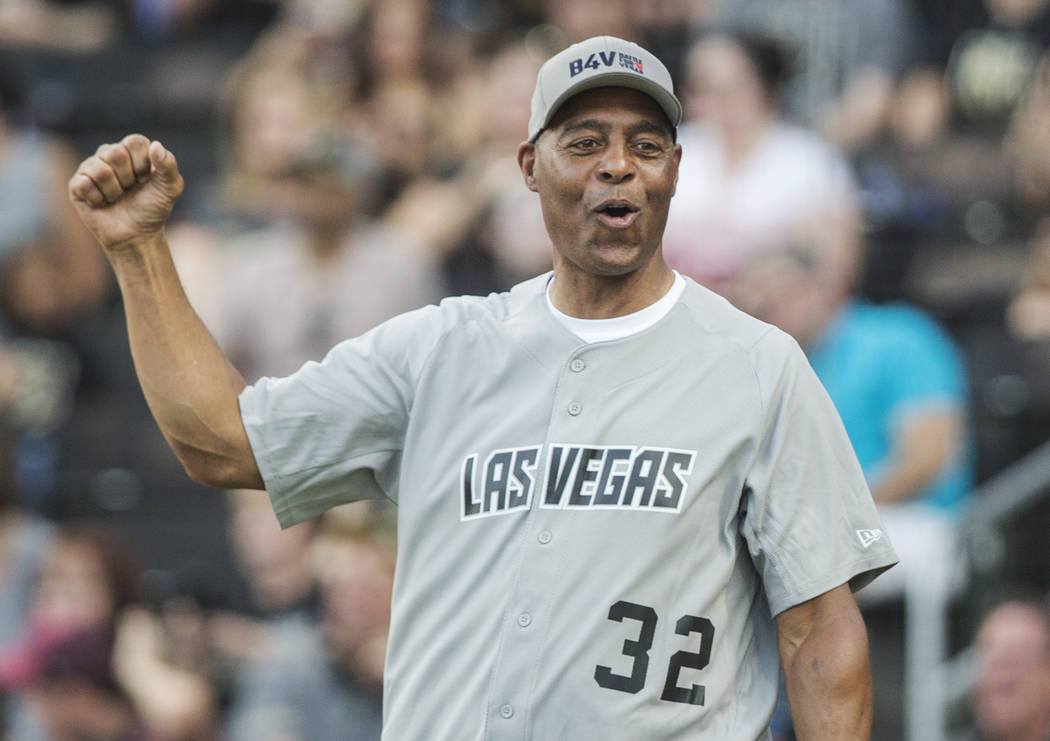 Former Oakland Raiders running back Marcus Allen fires up his team during the Battle For Vegas ...