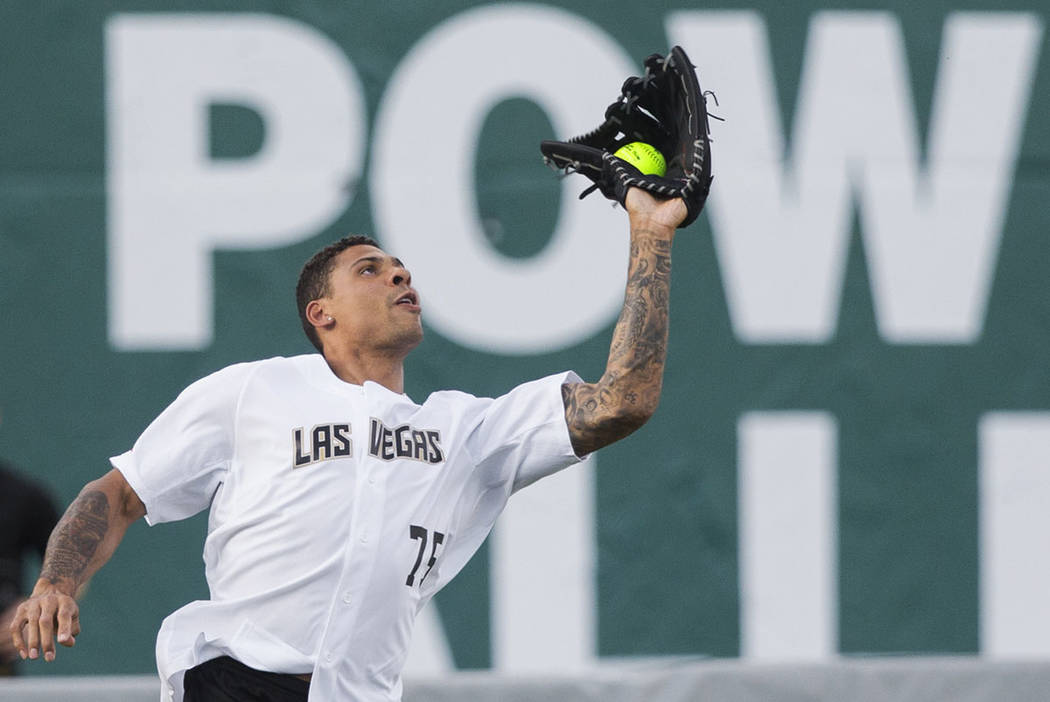 Golden Knights right wing Ryan Reaves makes a catch in left field during the Battle For Vegas C ...