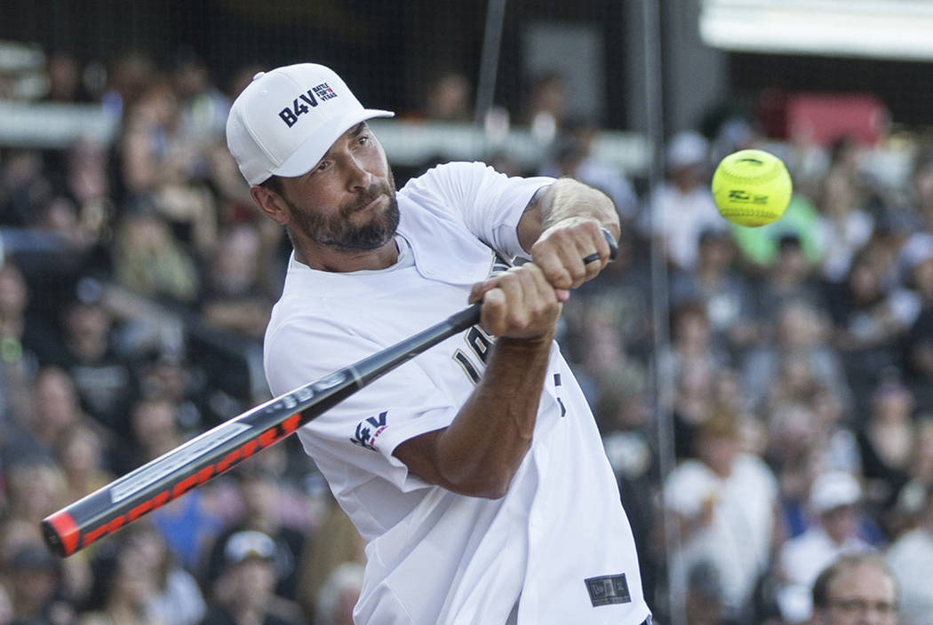 Golden Knights defenseman Deryk Engelland takes a swing during the home run derby at the Battle ...