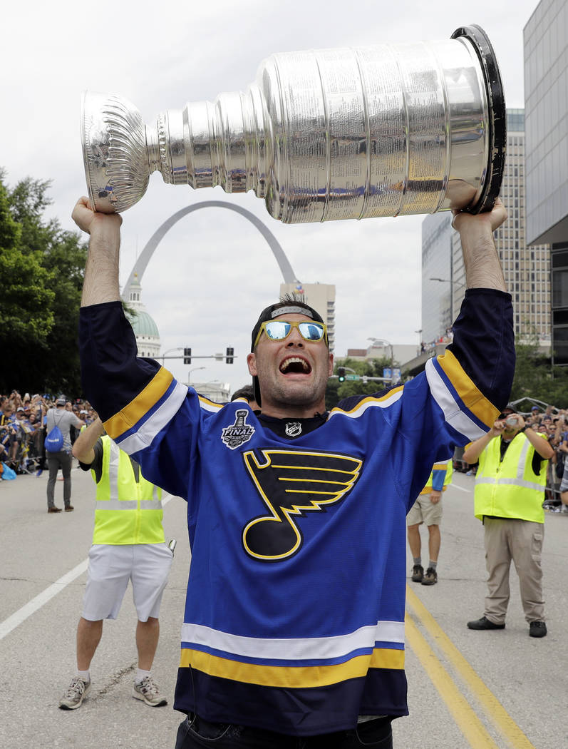 St. Louis Blues left wing Pat Maroon carries the Stanley Cup during the Blues' NHL hockey Stanl ...