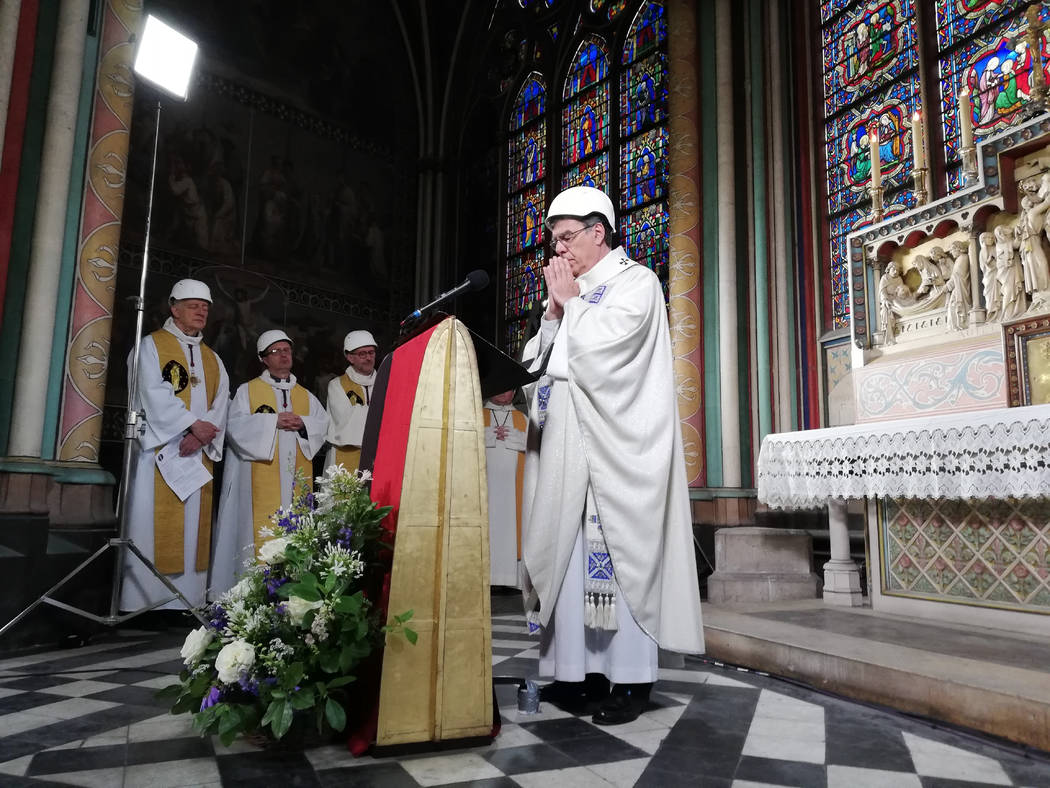 The Archbishop of Paris Michel Aupetit leads the first mass in a side chapel, two months after ...