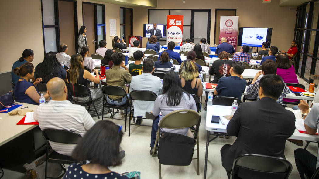 Rep. Steven Horsford answers a question to volunteers during an Asian Community Development Cou ...