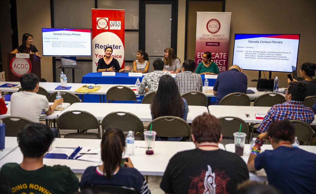 A roundtable on census takes place during an Asian Community Development Council sponsored semi ...