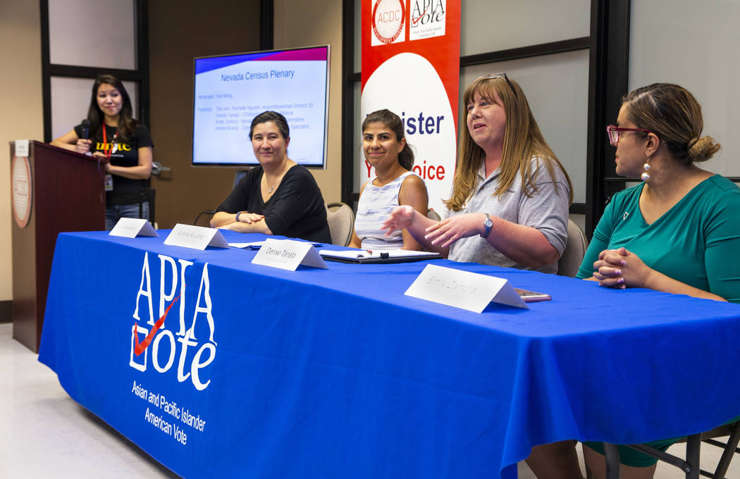 A roundtable on census takes place during an Asian Community Development Council sponsored semi ...