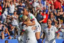 US players celebrate after teammate Julie Ertz scored their side's second goal during the Women ...