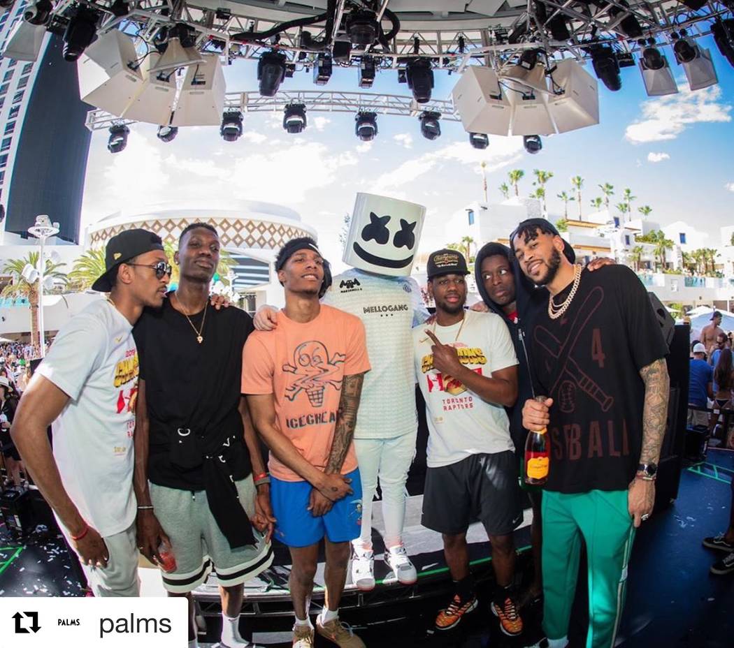 Star DJ Marshmello is shown with members of the NBA Champion Toronto Raptors at Kaos Dayclub on ...