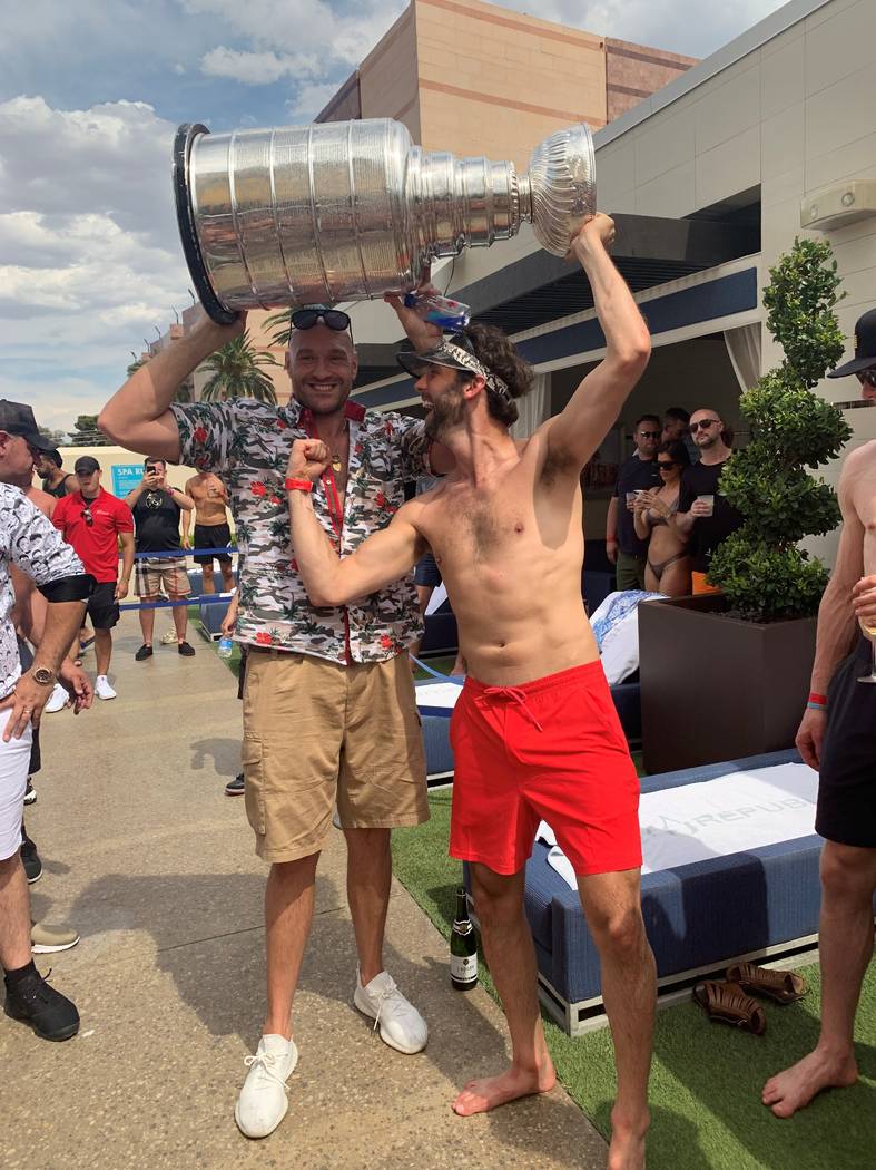 Tyson Fury and Robert Bortuzzo of the St. Louis Blues are shown with the Stanley Cup at Wet Rep ...