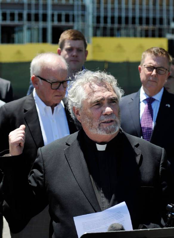 Anti-abortion activist Rev. Terry Gensemer gestures toward a new clinic being constructed by Pl ...