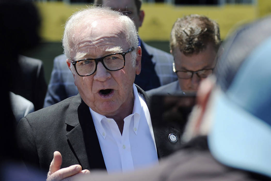 Harry Reeder, a Presbyterian pastor who opposes abortion, addresses the media outside the site ...