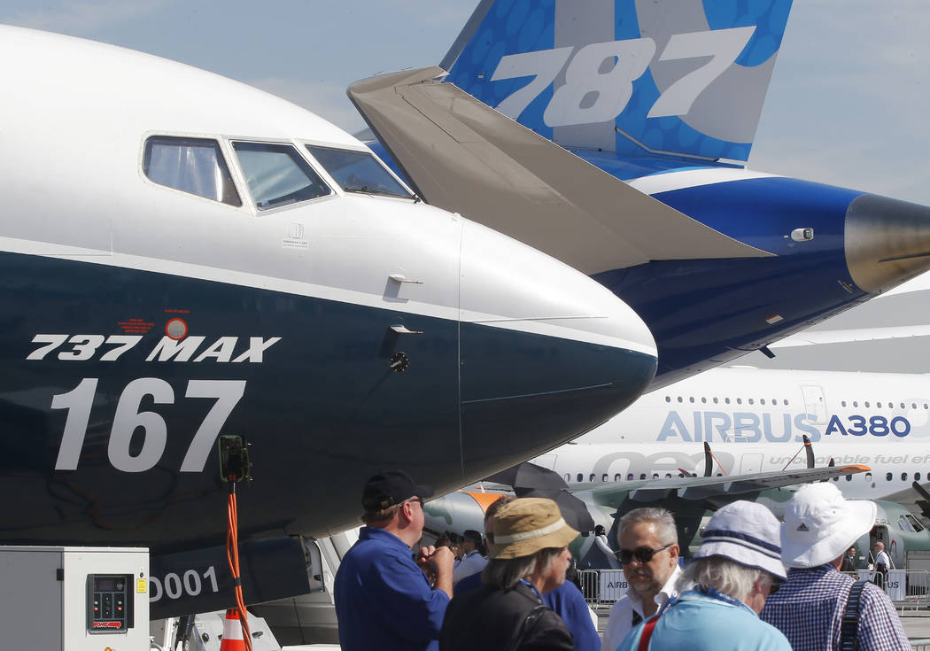 FILE - In this June 20, 2017, file photo Boeing planes displayed at Paris Air Show, in Le Bourg ...