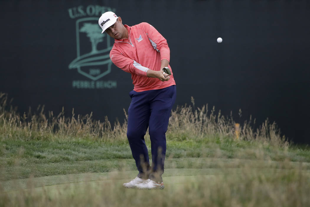 Gary Woodland chips off the 17th green during the final round of the U.S. Open Championship gol ...