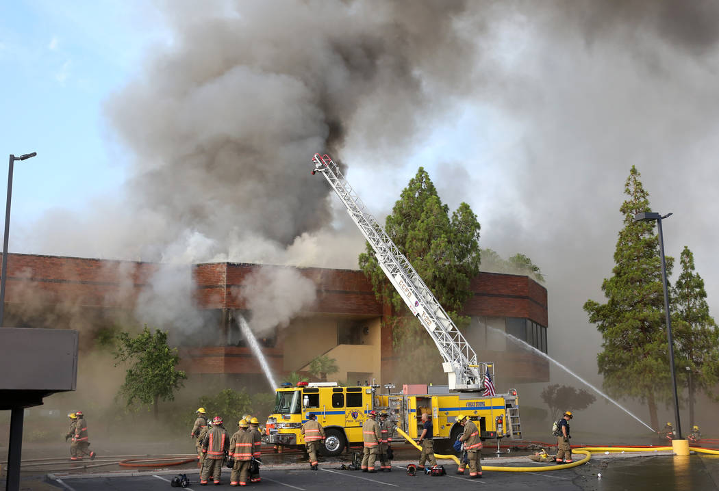 Clark County and Las Vegas fire crews battle a blaze at The Park at 3900 at 3900 Paradise Road, ...