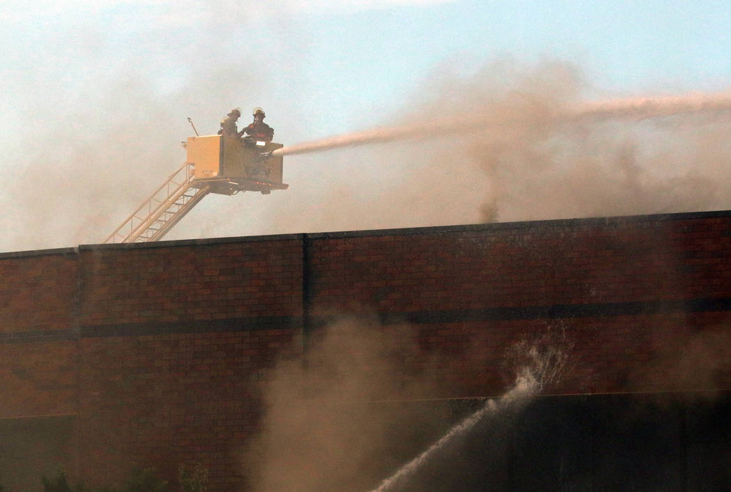 Clark County and Las Vegas fire crews battle a blaze at The Park at 3900 at 3900 Paradise Road, ...