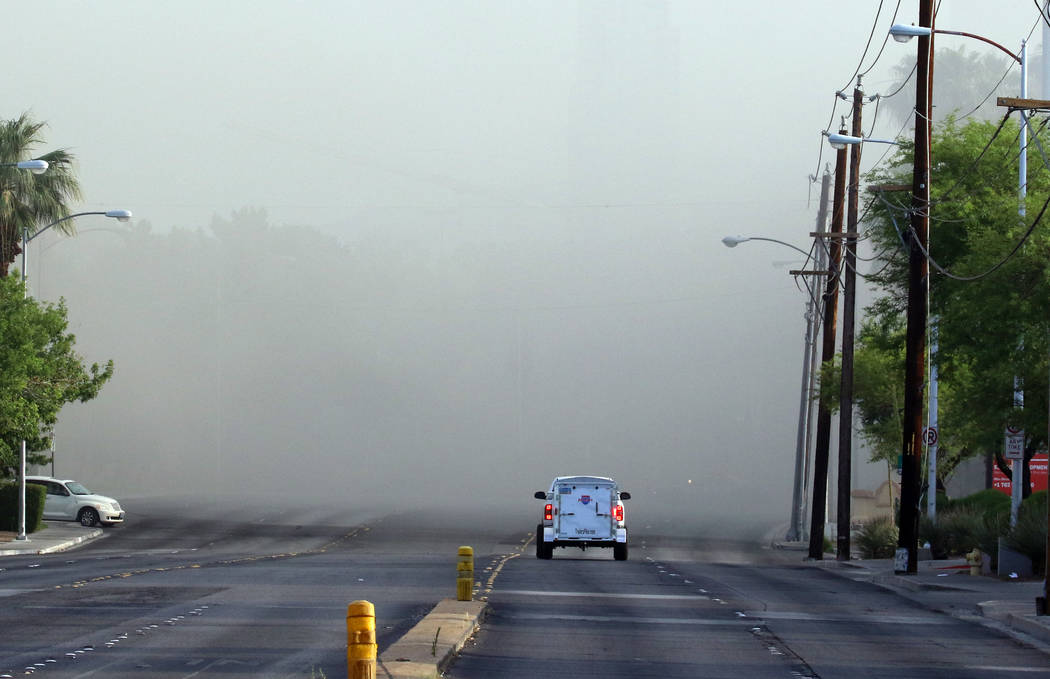 Paradise Road was closed between East Flamingo Road and Twain Avenue as fire crews battled a bl ...