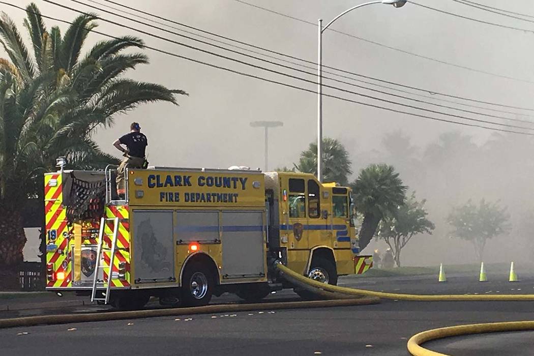 The Clark County Fire Department battles a fire at a business complex near Paradise Road and Ea ...