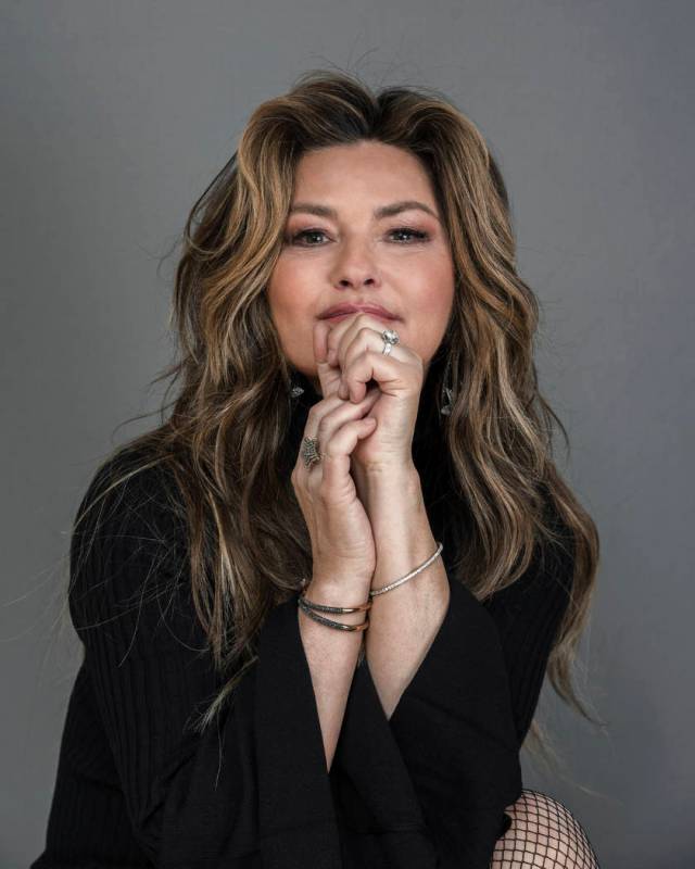 Shania Twain poses for a portrait at her Manhattan hotel, Friday, June 14, 2019, in New York. T ...