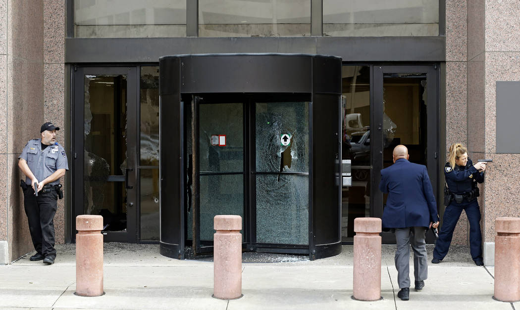 The federal courthouse is secured moments after shots were fired Monday, June 17, 2019, at the ...