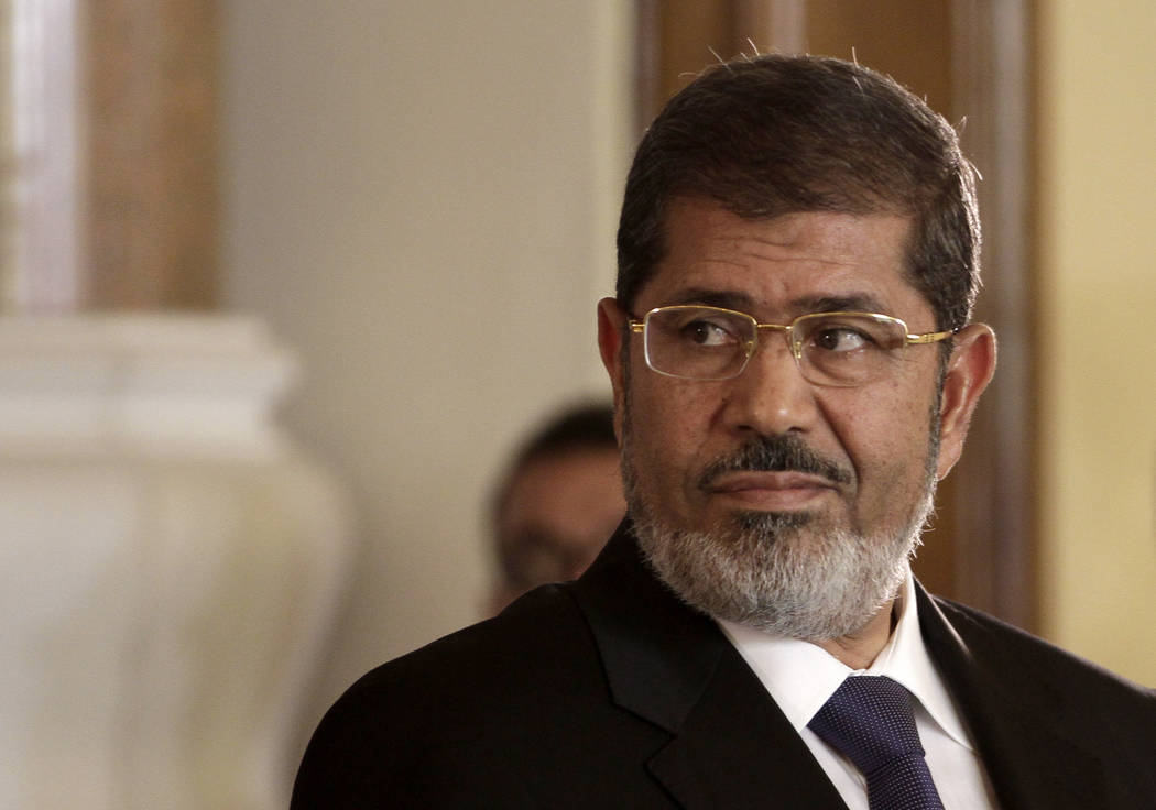 The-Egyptian President Mohammed Morsi holds a news conference at the Presidential palace in Cai ...