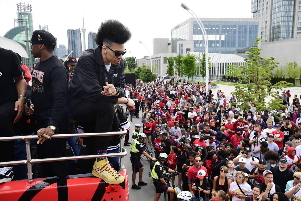 Toronto Raptors guard Danny Green smokes a cigar as he celebrates during the 2019 Toronto Rapto ...