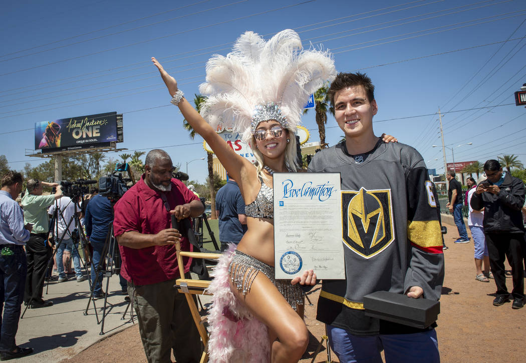 Heather Neckritz, left, poses for a photograph with ÒJeopardy!Ó sensation James Holzh ...