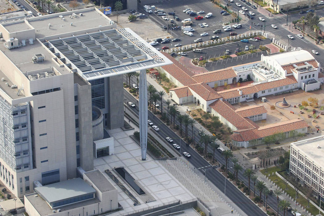 The Lloyd George U.S. Courthouse, at left, was the scene of a fatal shooting on Jan. 4, 2010. ( ...