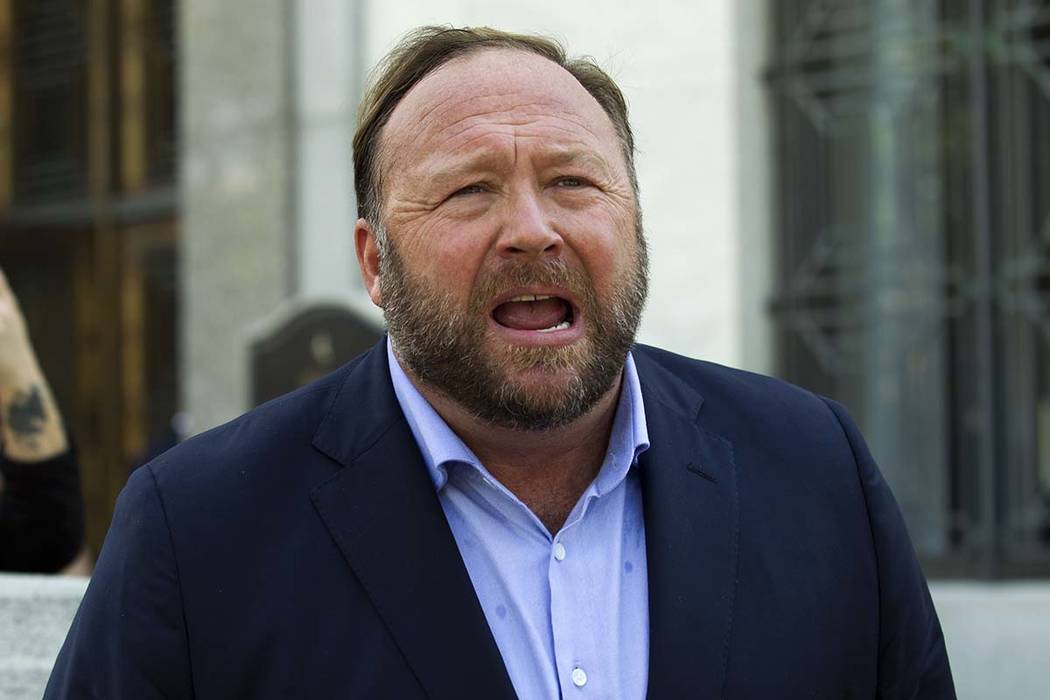 In a Sept. 5, 2018, file photo, Alex Jones speaks to reporters in Washington. Lawyers in Connec ...