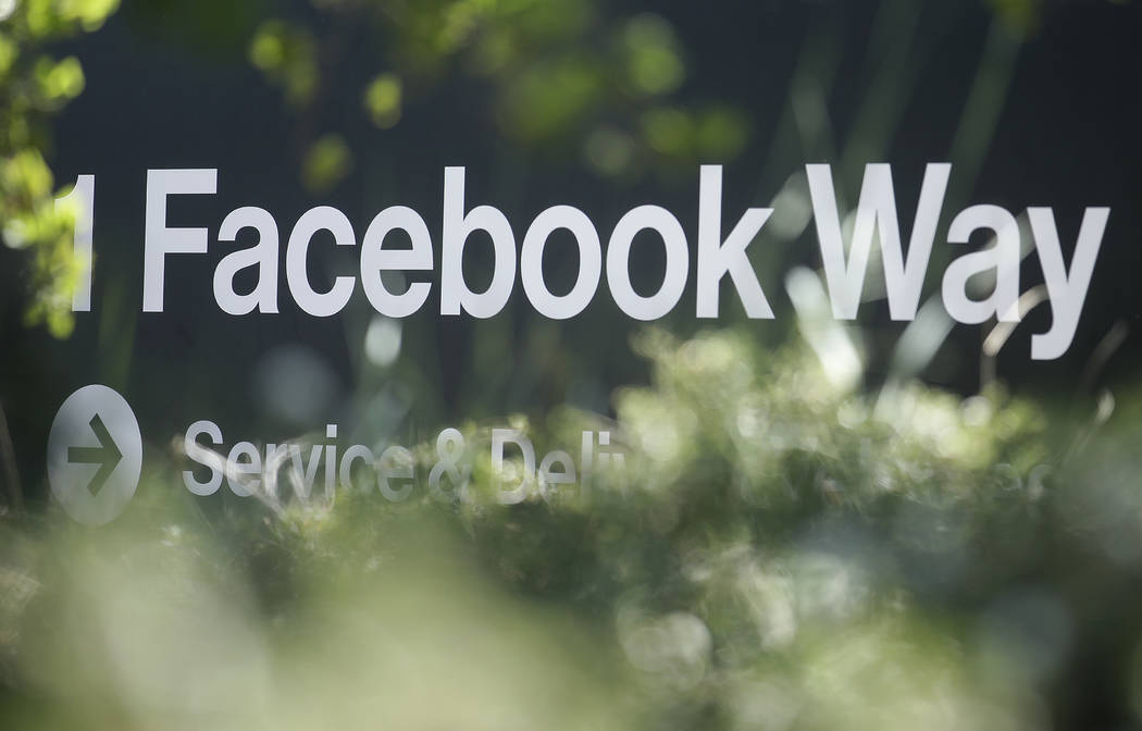 FILE - In this April 25, 2019, file photo an address sign for Facebook Way is shown in Menlo Pa ...