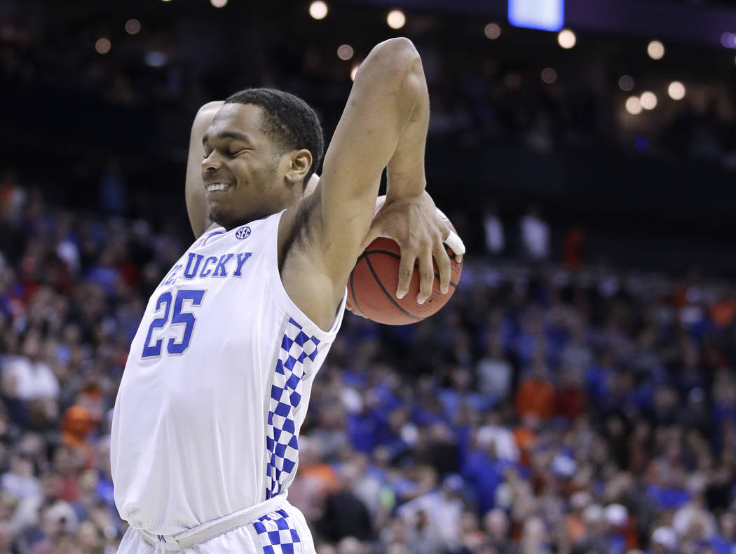 Kentucky's PJ Washington reacts after missing a basket during overtime of the Midwest Regional ...