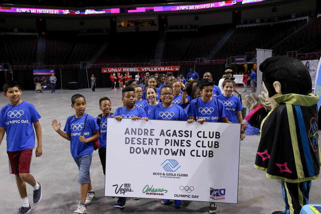 Andre Agassi, Desert Pines and Downtown Boys & Girls Clubs march in the procession on Olymp ...