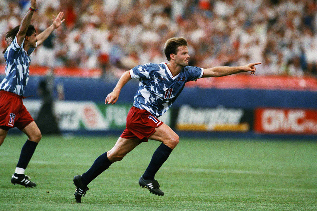 United States national team forward Eric Wynalda, right, reacts after he scored against Switzer ...