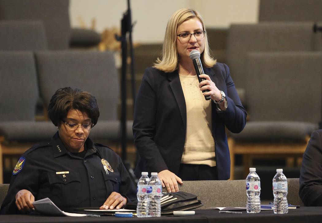 Phoenix Mayor Kate Gallego addresses the audience as Phoenix Police Chief Jeri Williams, left, ...