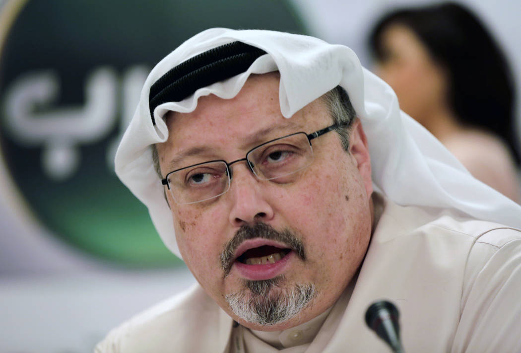 In this Dec. 15, 2014, file photo, Saudi journalist Jamal Khashoggi speaks during a press confe ...