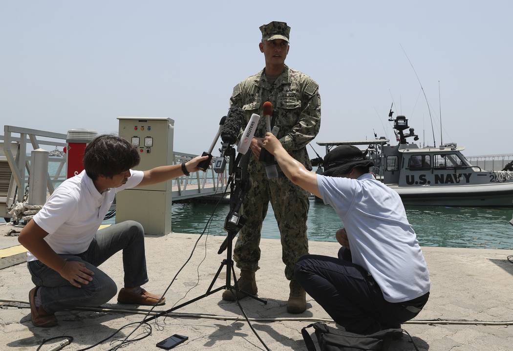 Cmdr. Sean Kido of the U.S. Navy's 5th Fleet speaks to journalists at a 5th Fleet Base, during ...