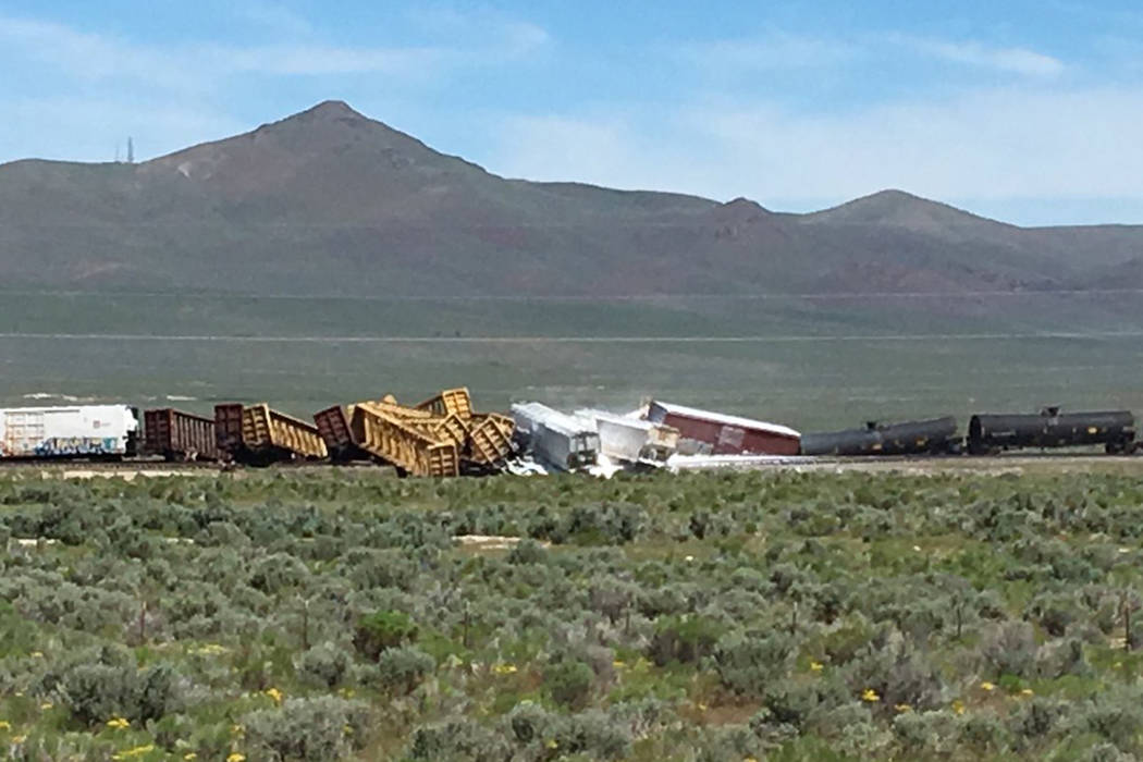 A train carrying ammunition, grenades and vegetable oil derailed Wednesday morning, June 19, 20 ...