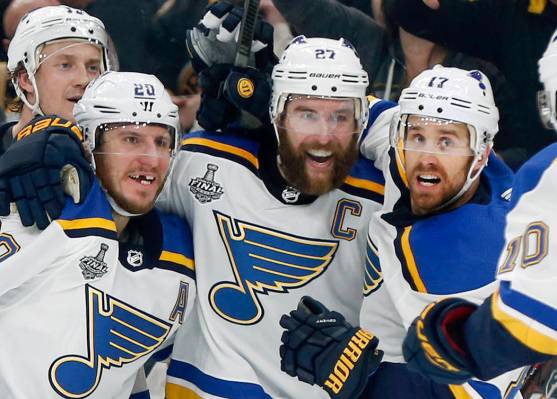 St. Louis Blues' Alex Pietrangelo, second from right, celebrates his goal with teammates Jay Bo ...