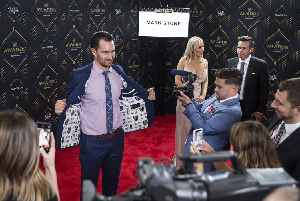 Golden Knights Mark Stone shows off his new suit on the red carpet before the start of the NHL ...