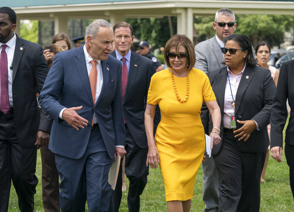 Senate Minority Leader Chuck Schumer, D-N.Y., left, and Speaker of the House Nancy Pelosi, D-Ca ...