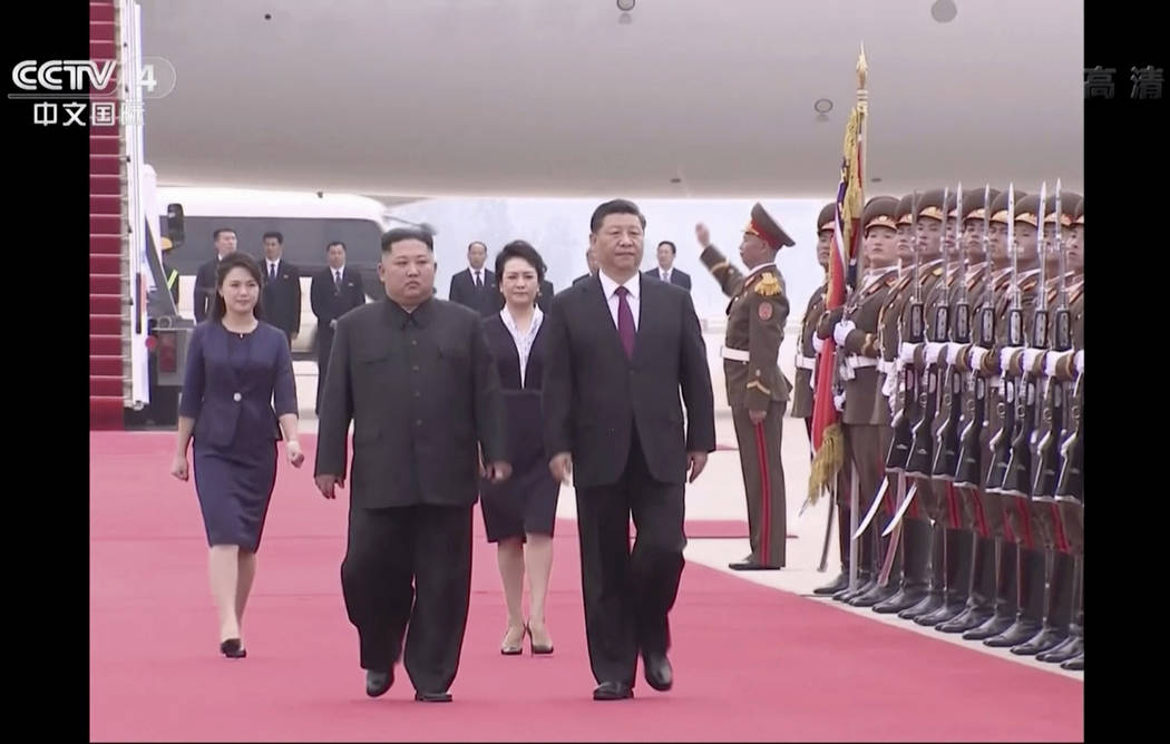 In this image taken from a video footage run by China's CCTV, North Korean leader Kim Jong Un, ...