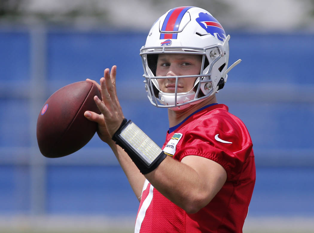 Buffalo Bills quarterback Josh Allen (17) looks to throw the ball during an NFL football team p ...