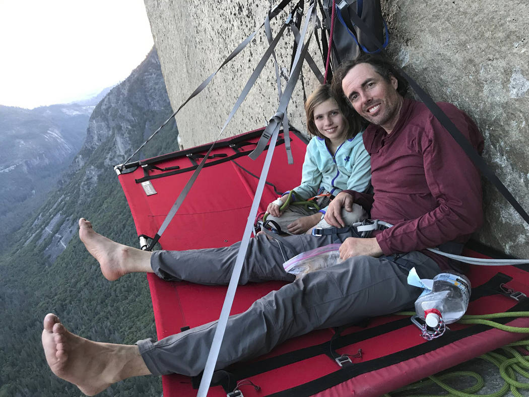 In this June 11, 2019, photo, is Michael Schneiter posing with his daughter, Selah Schneiter, d ...