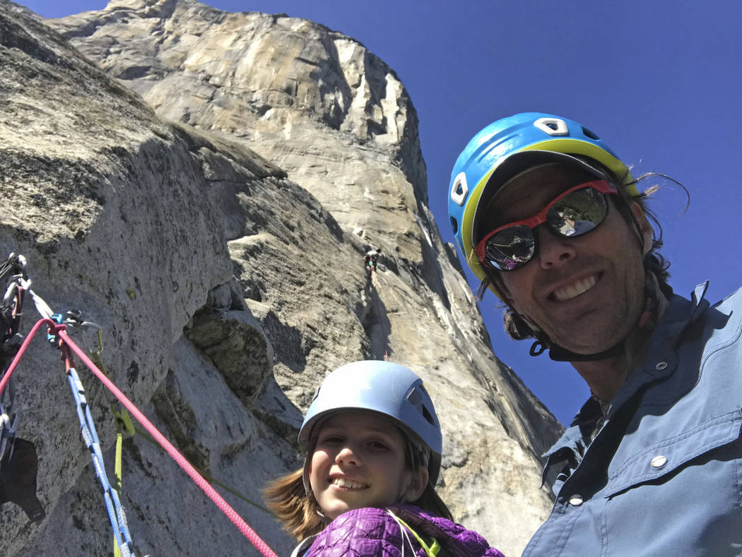 In this June 8, 2019, photo, is Michael Schneiter posing with his daughter, Selah Schneiter, at ...