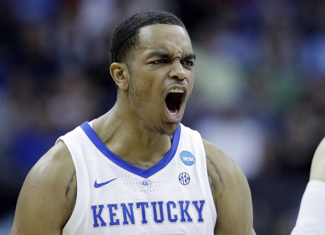 Kentucky's PJ Washington celebrates during the first half of a men's NCAA tournament college ba ...