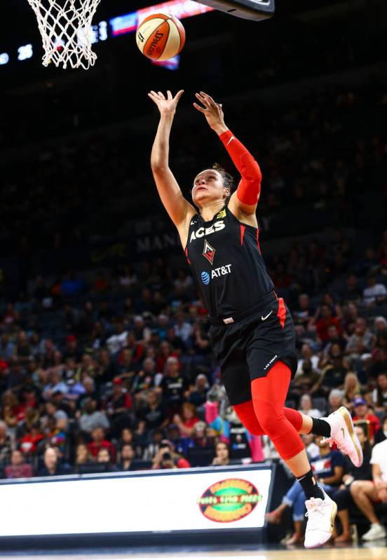 Las Vegas Aces guard Kayla McBride (21) goes to the basket against the Washington Mystics durin ...