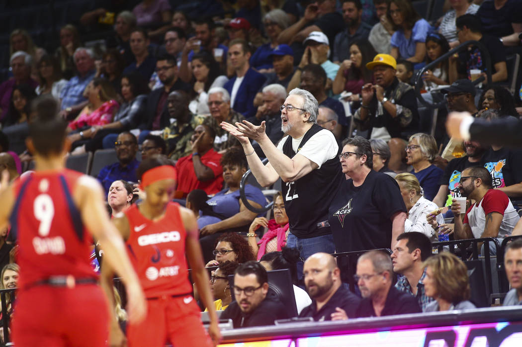 Las Vegas Aces fans react to a call during the first half of a WNBA basketball game against the ...